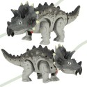 Dinozaur Triceratops chodzi świeci ryczy